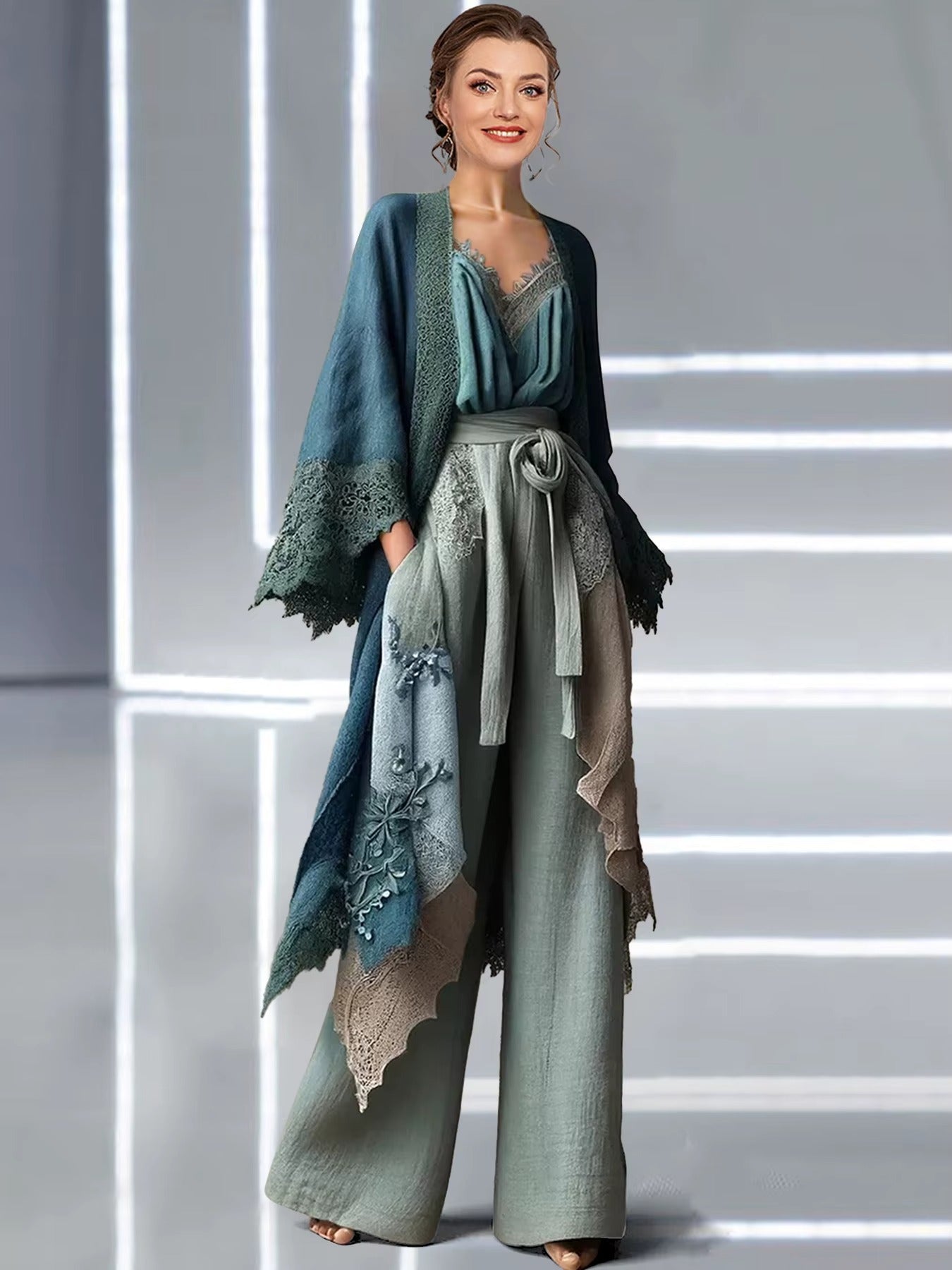 Outfit completo con spolverino blu aperto sopra pantaloni palazzo verde salvia, look bohémien elegante
